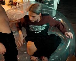 Two skinny guys sharing more than just a chair