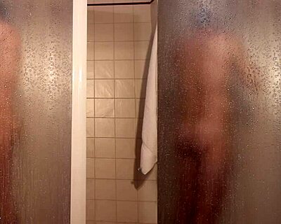 Friends showering after steamy gay sex in bathroom