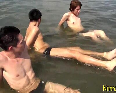 Gay Asian twinks giving a group handjob with cum fetish